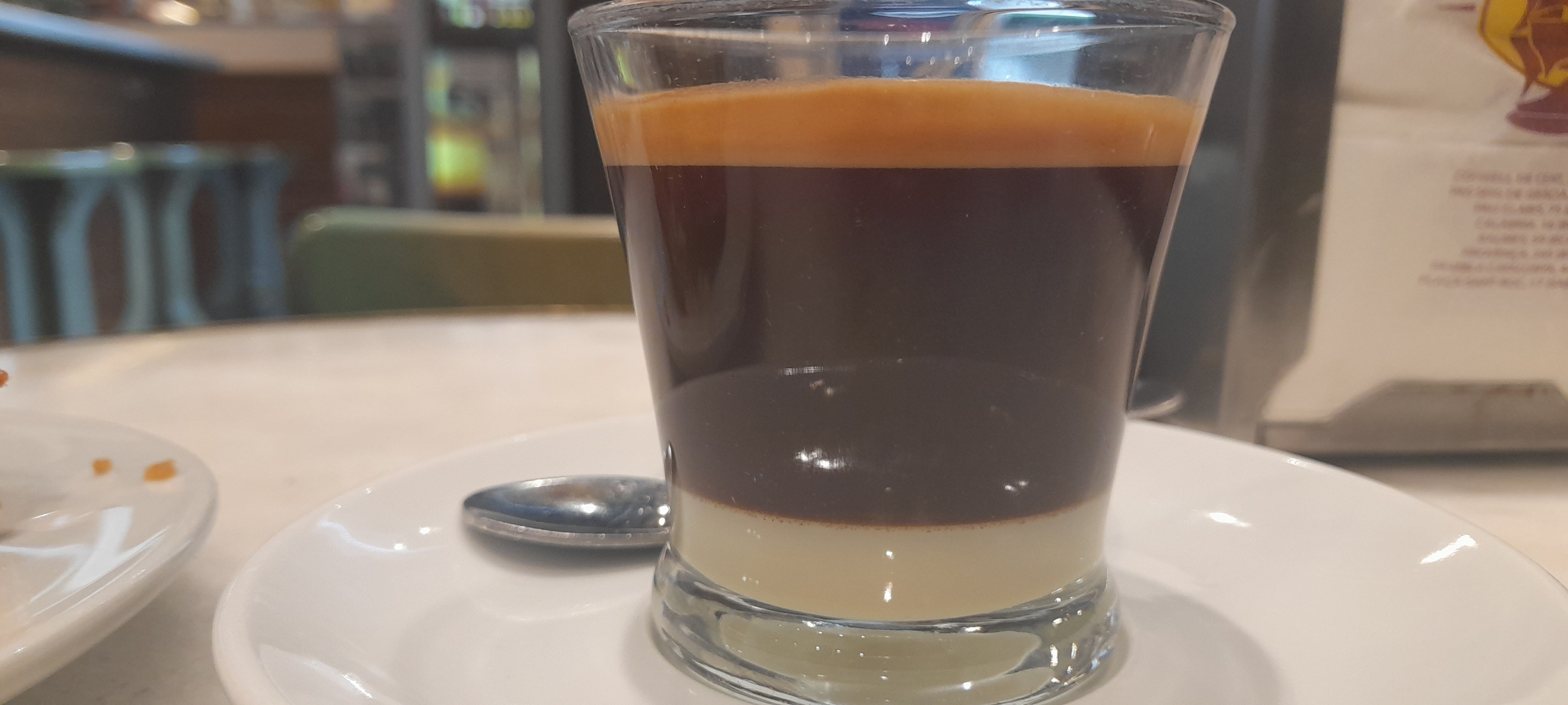 A delightfully separated condensed milk coffee with a generous shot of whiskeyin it, I drank this along with a very narrow sandwich